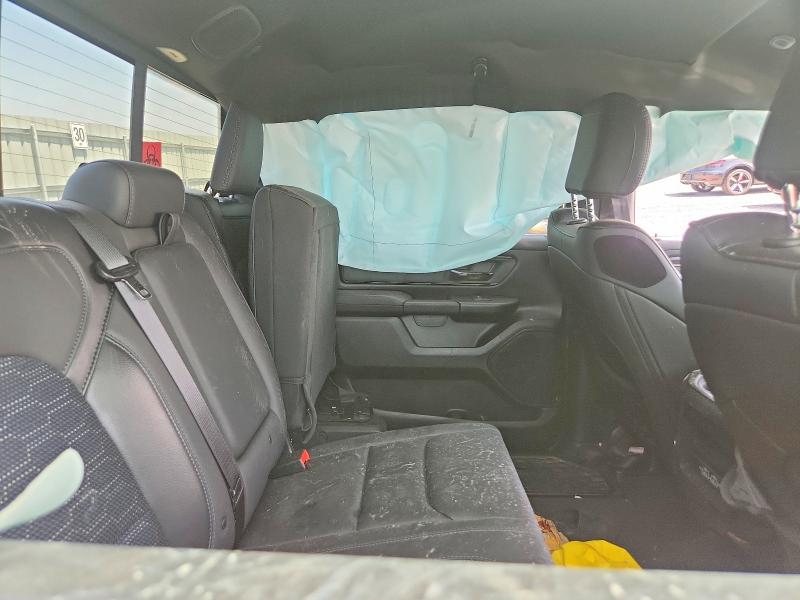 Photo 10 from auction – 2023 RAM 1500 with VIN 1C6SRFFT2PN565857