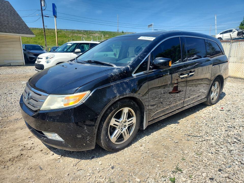 HONDA ODYSSEY 2012 with VIN 5FNRL5H97CB090963 - Photo from auction