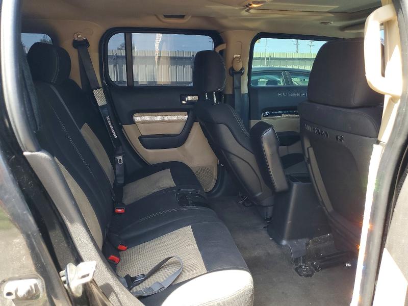 Photo 11 from auction – 2009 HUMMER H3 with VIN 5GTEN13E798104495