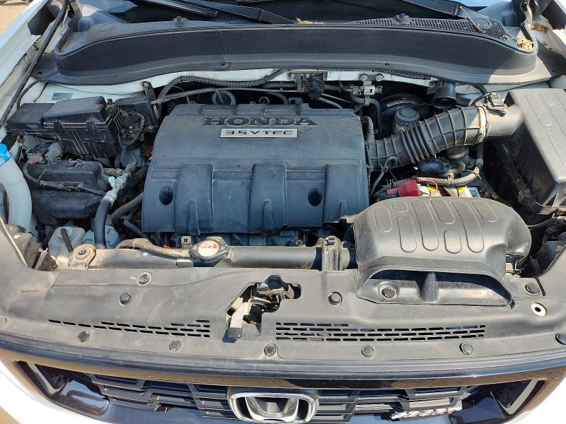 Photo 11 from auction – 2014 HONDA RIDGELINE with VIN 5FPYK1F7XEB010218