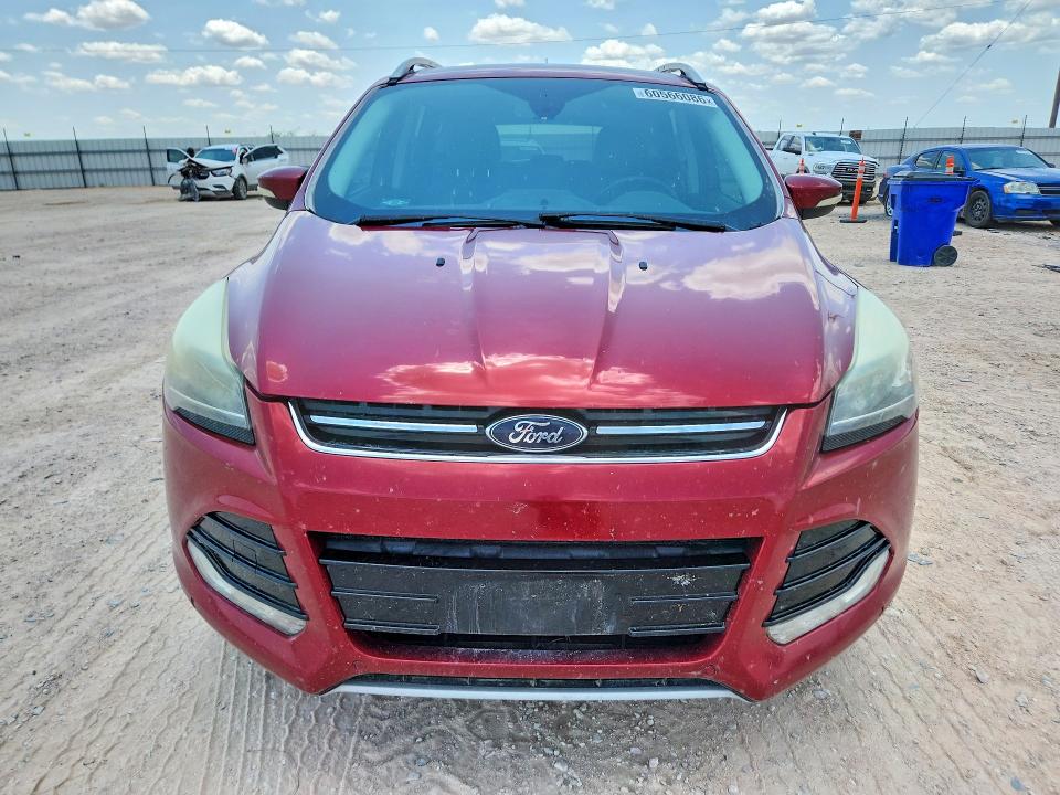 Photo 5 from auction – 2015 FORD ESCAPE with VIN 1FMCU0J99FUC42684