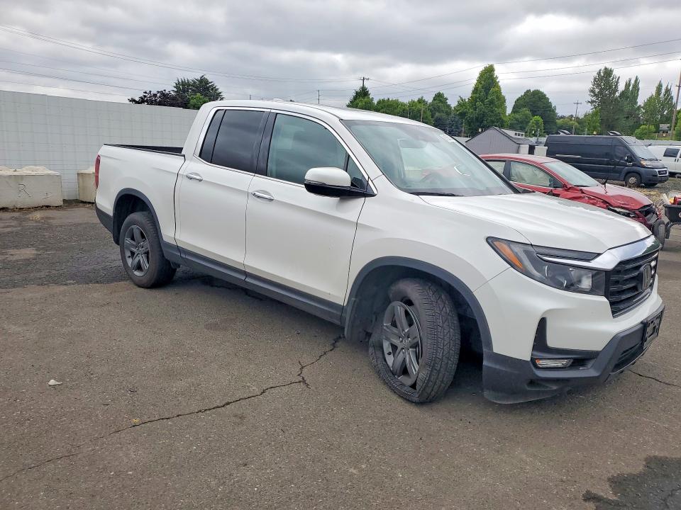 Photo 4 from auction – 2023 HONDA RIDGELINE with VIN 5FPYK3F78PB035276