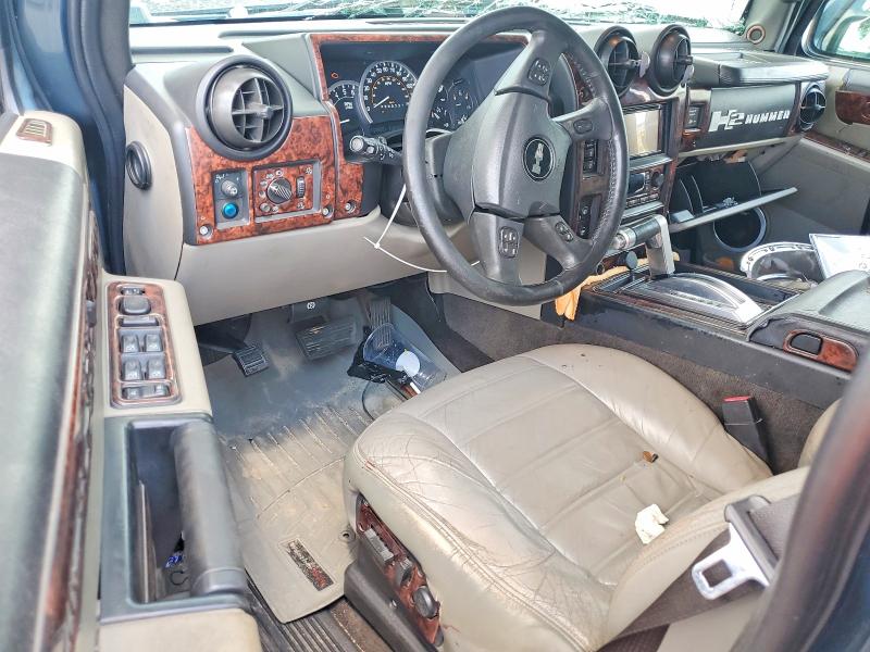 Photo 8 from auction – 2006 HUMMER H2 with VIN 5GRGN23U46H106339