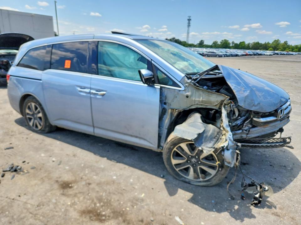 Photo 4 from auction – 2014 HONDA ODYSSEY with VIN 5FNRL5H99EB125974