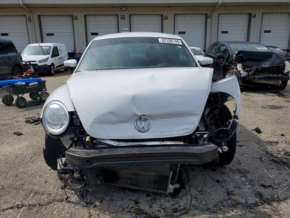 Photo 5 from auction – 2018 VOLKSWAGEN BEETLE with VIN 3VWFD7AT4JM714189