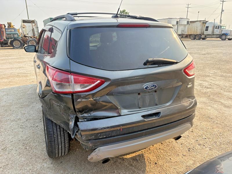 Photo 4 from auction – 2015 FORD ESCAPE with VIN 1FMCU9GX3FUB76577