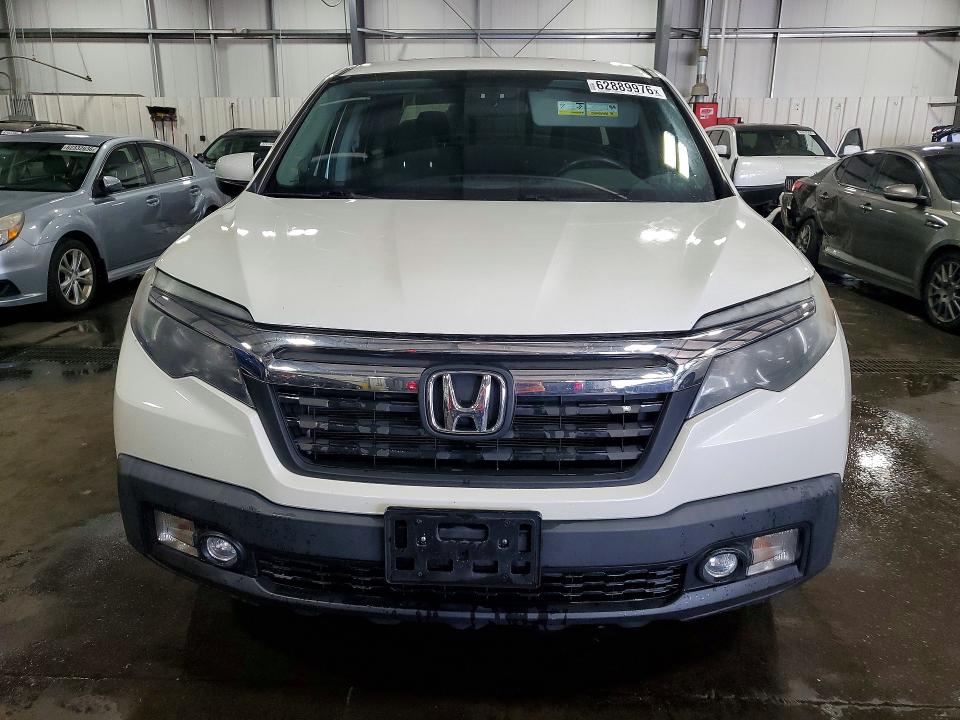 Photo 5 from auction – 2019 HONDA RIDGELINE with VIN 5FPYK3F58KB013947