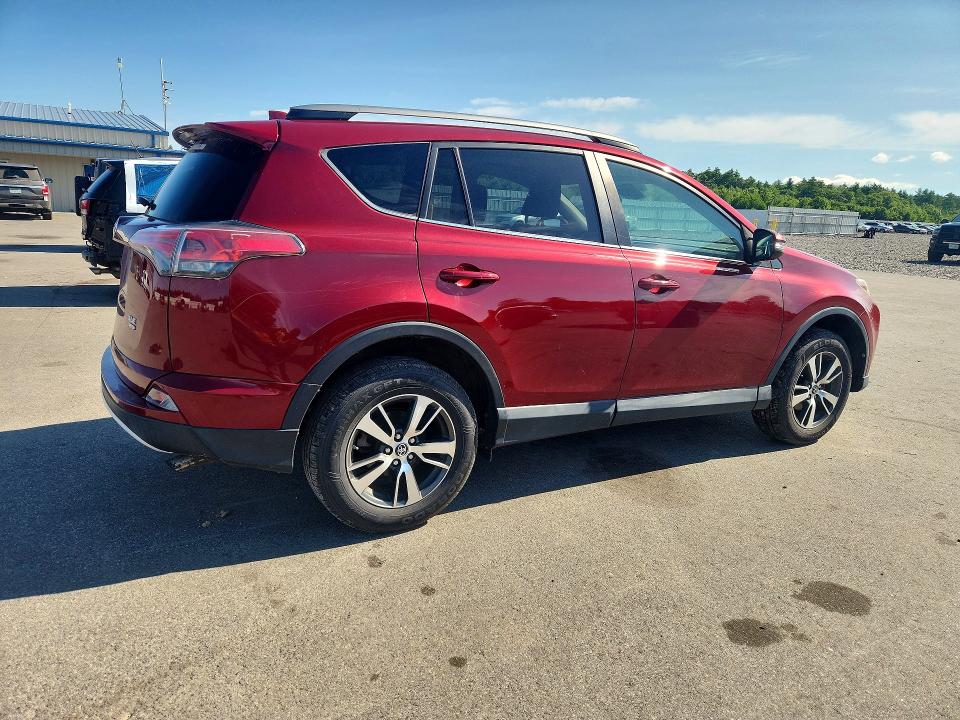 Photo 3 from auction – 2018 TOYOTA RAV4 with VIN 2T3RFREVXJW816533