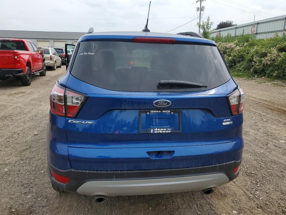 Photo 6 from auction – 2018 FORD ESCAPE with VIN 1FMCU9HDXJUD03709