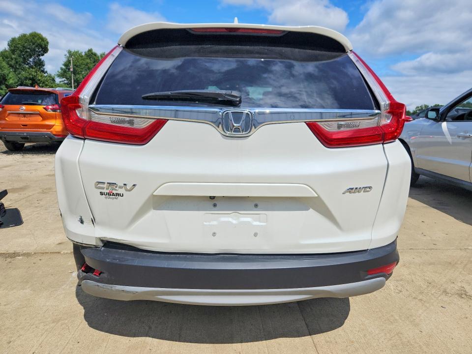 Photo 6 from auction – 2018 HONDA CR-V with VIN 2HKRW2H50JH611989