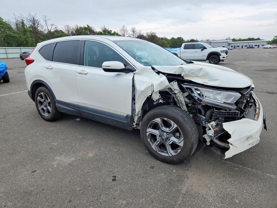 Photo 4 from auction – 2017 HONDA CR-V with VIN 2HKRW2H53HH614380
