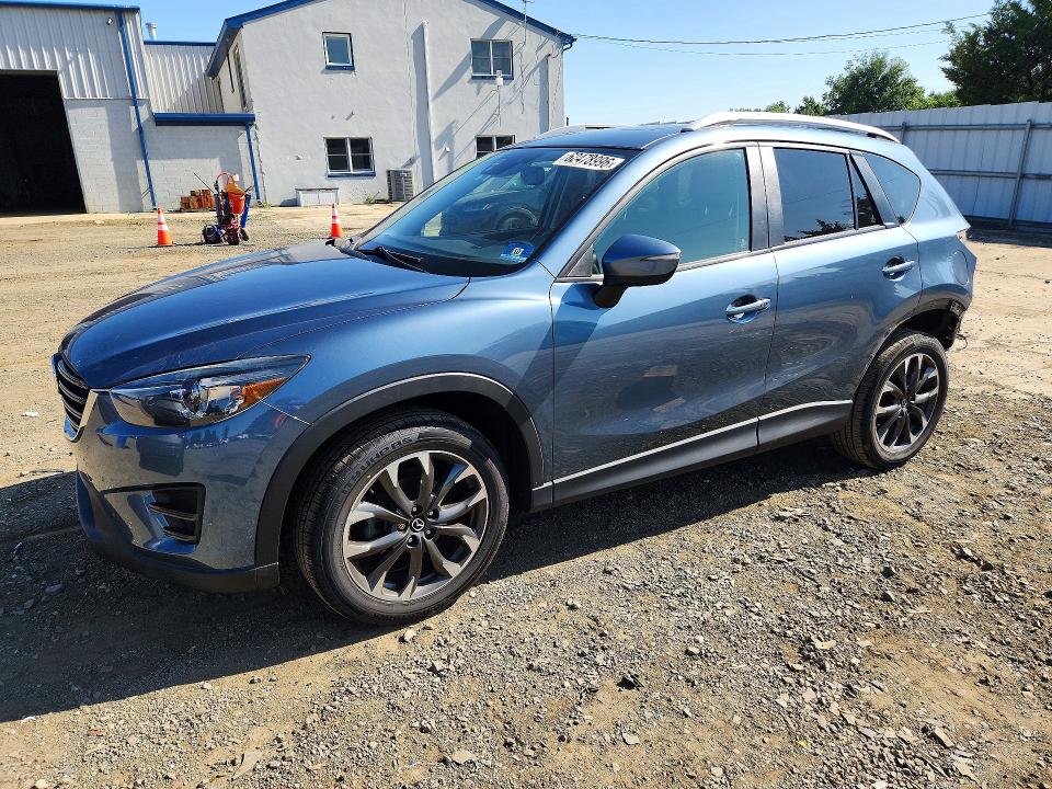 MAZDA CX-5 2016 with VIN JM3KE4DY1G0838461 - Photo from auction