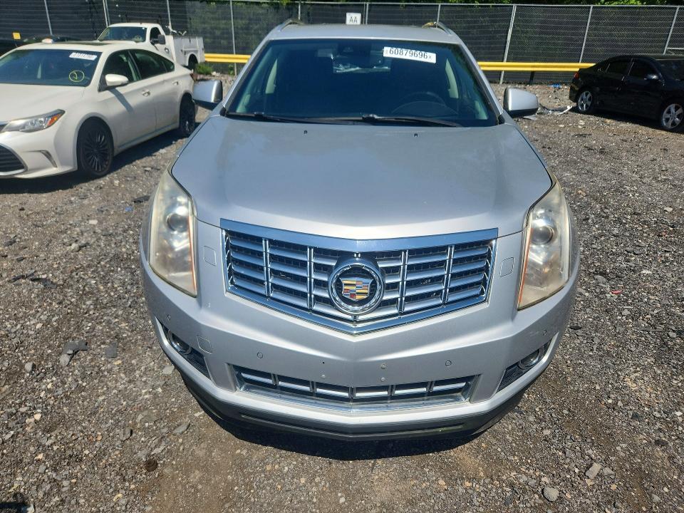 Photo 5 from auction – 2014 CADILLAC SRX with VIN 3GYFNDE39ES596306