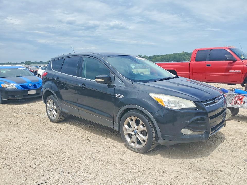 Photo 4 from auction – 2013 FORD ESCAPE with VIN 1FMCU9H91DUA72764