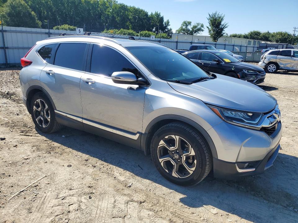 Photo 4 from auction – 2017 HONDA CR-V with VIN 7FARW1H95HE034256
