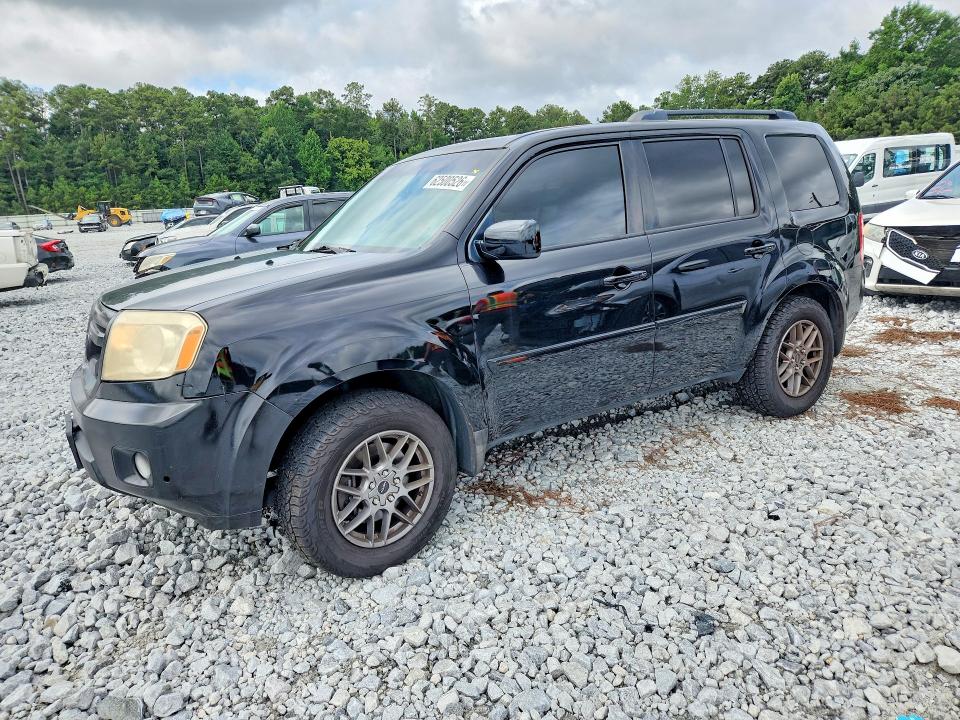 HONDA PILOT 2011 with VIN 5FNYF4H5XBB002545 - Photo from auction