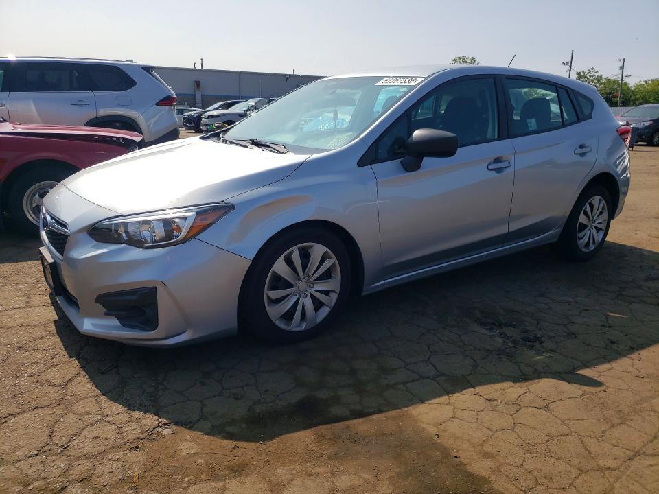 SUBARU IMPREZA 2018 with VIN 4S3GTAA64J3714132 - Photo from auction