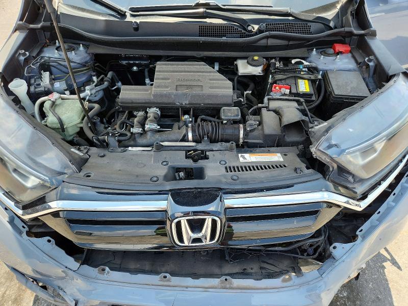 Photo 12 from auction – 2021 HONDA CR-V with VIN 7FARW1H84ME024061