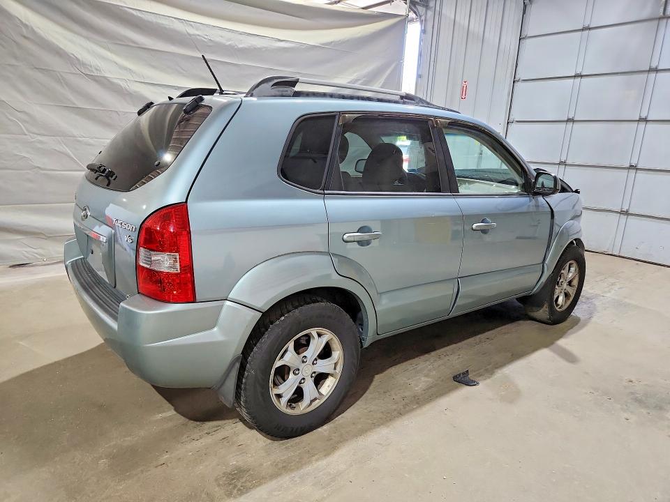 Photo 3 from auction – 2009 HYUNDAI TUCSON with VIN KM8JN72D69U968412