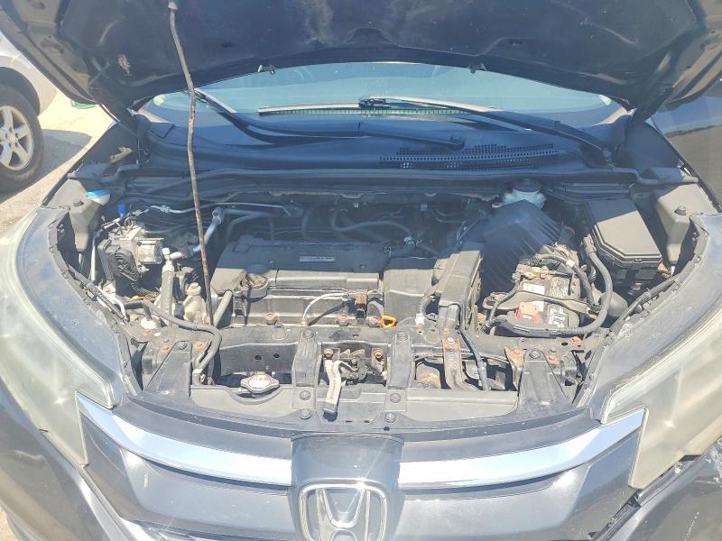 Photo 12 from auction – 2016 HONDA CR-V with VIN 5J6RM4H31GL141132