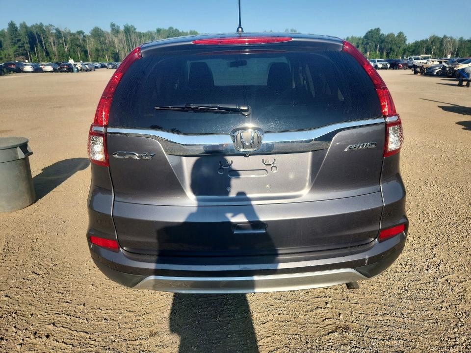 Photo 6 from auction – 2016 HONDA CR-V with VIN 2HKRM4H57GH128624