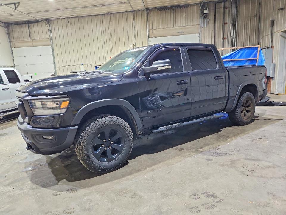 RAM 1500 2020 with VIN 1C6SRFLT6LN401011 - Photo from auction