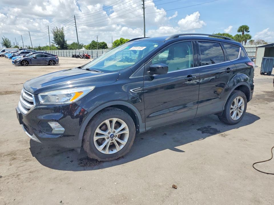FORD ESCAPE 2018 with VIN 1FMCU0GD4JUC61311 - Photo from auction