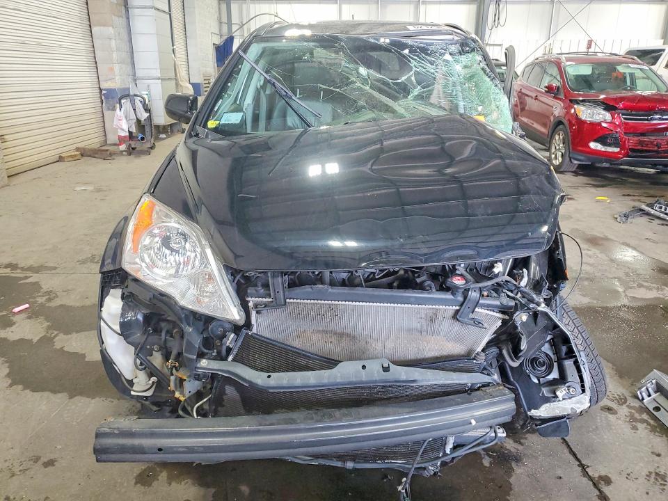 Photo 5 from auction – 2011 HONDA CR-V with VIN JHLRE4H74BC000296