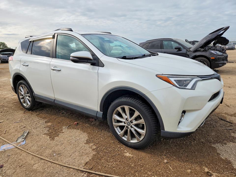 Photo 4 from auction – 2018 TOYOTA RAV4 with VIN 2T3DFREV5JW754081