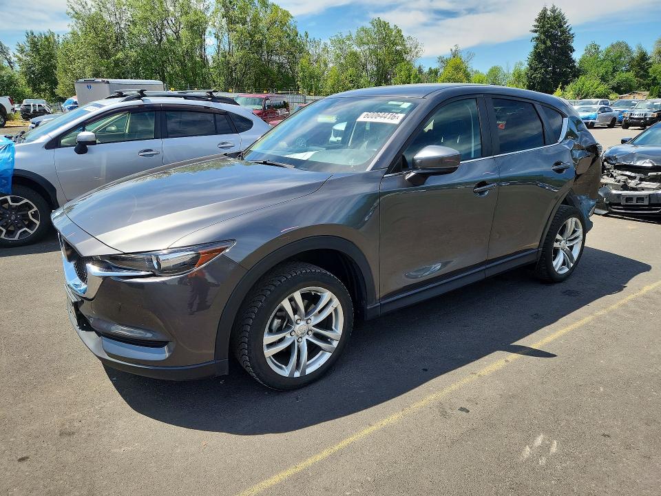 MAZDA CX-5 2018 with VIN JM3KFACM9J1468761 - Photo from auction