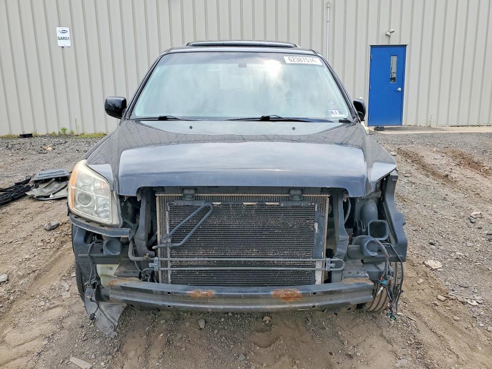 Photo 5 from auction – 2006 HONDA PILOT with VIN 2HKYF18676H539016