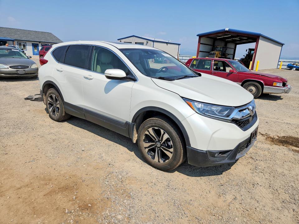 Photo 4 from auction – 2018 HONDA CR-V with VIN 2HKRW2H8XJH674589