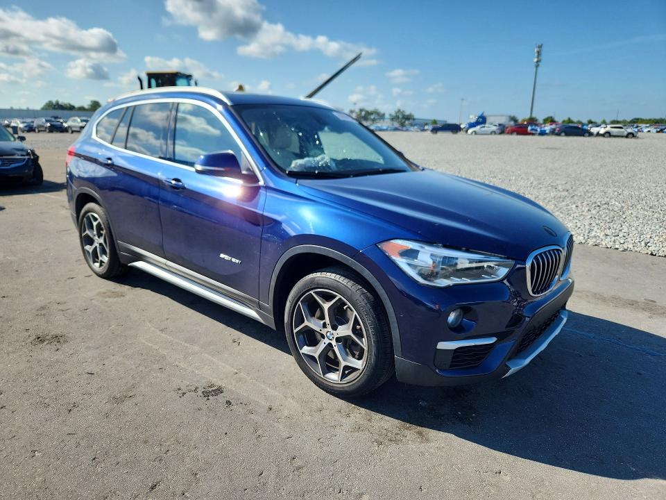 Photo 4 from auction – 2017 BMW X1 with VIN WBXHU7C34H5H37583