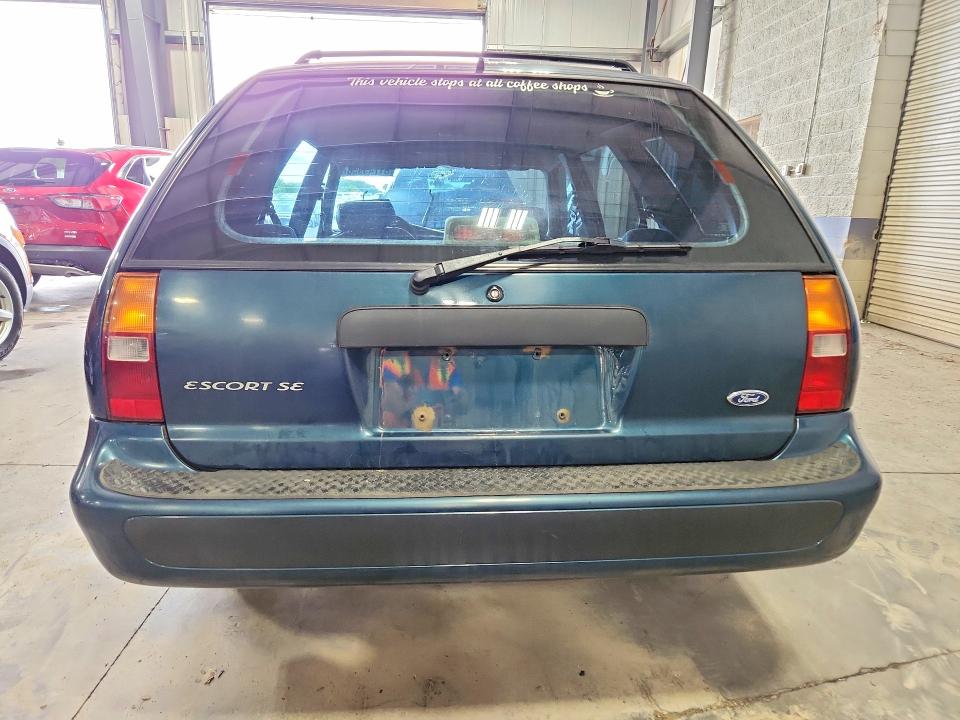 Photo 6 from auction – 1998 FORD ESCORT with VIN 3FAFP15P2WR226962