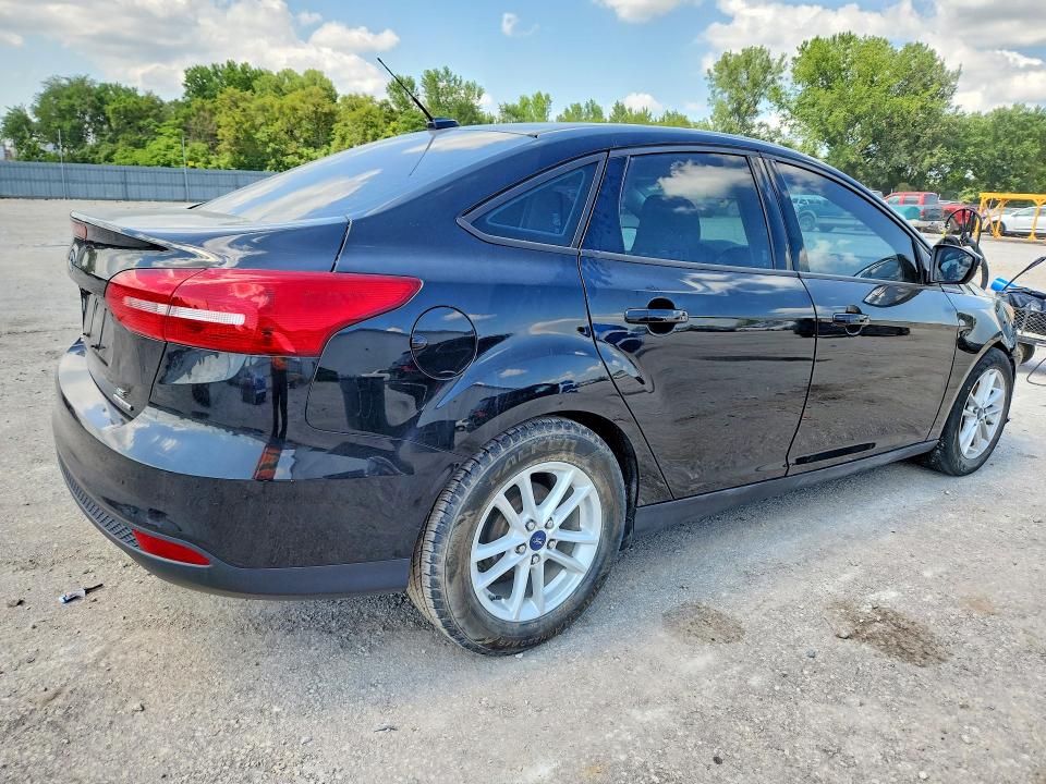 Photo 3 from auction – 2015 FORD FOCUS with VIN 1FADP3F25FL255652