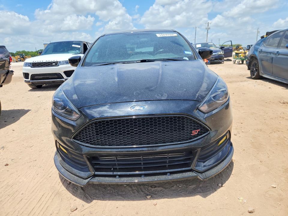 Photo 5 from auction – 2018 FORD FOCUS with VIN 1FADP3L91JL332575