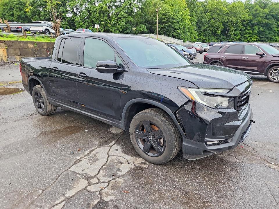 Photo 4 from auction – 2023 HONDA RIDGELINE with VIN 5FPYK3F80PB042697