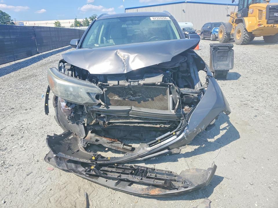 Photo 5 from auction – 2014 HONDA CR-V with VIN 2HKRM4H7XEH707976