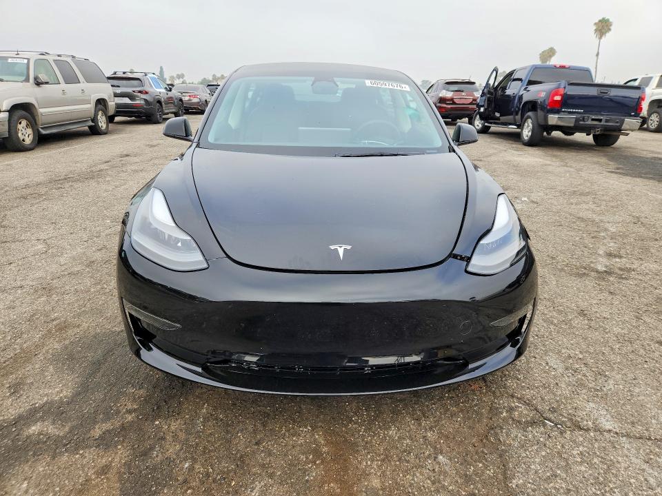 Photo 5 from auction – 2023 TESLA MODEL 3 with VIN 5YJ3E1EAXPF707642
