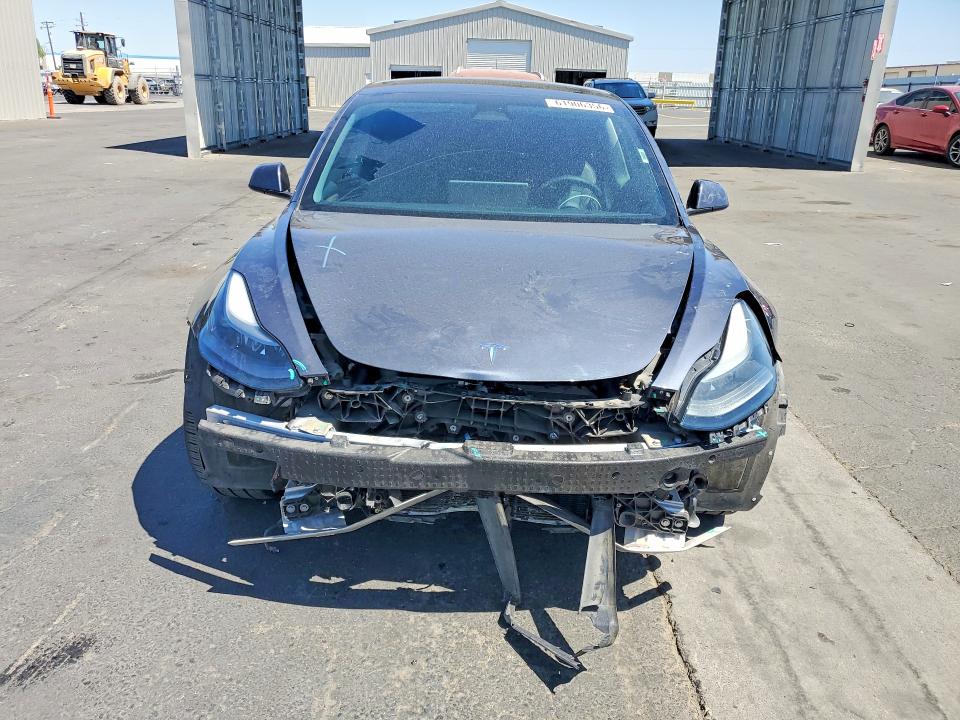 Photo 5 from auction – 2023 TESLA MODEL 3 with VIN 5YJ3E1EC5PF498229