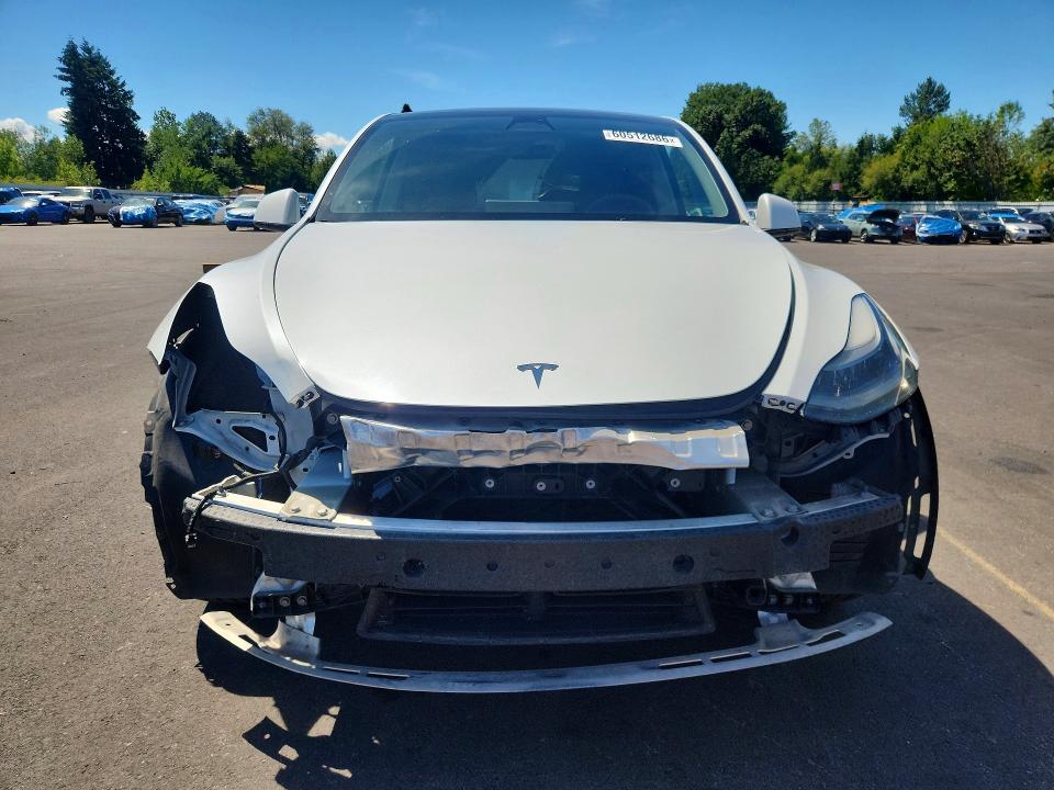 Photo 5 from auction – 2022 TESLA MODEL Y with VIN 7SAYGDEE8NF558491