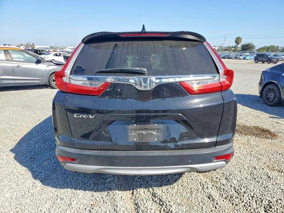 Photo 6 from auction – 2018 HONDA CR-V with VIN 5J6RW1H89JA006049