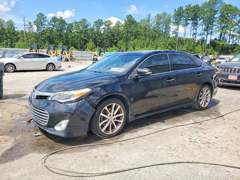 TOYOTA AVALON 2014 with VIN 4T1BK1EB9EU083684 - Photo from auction