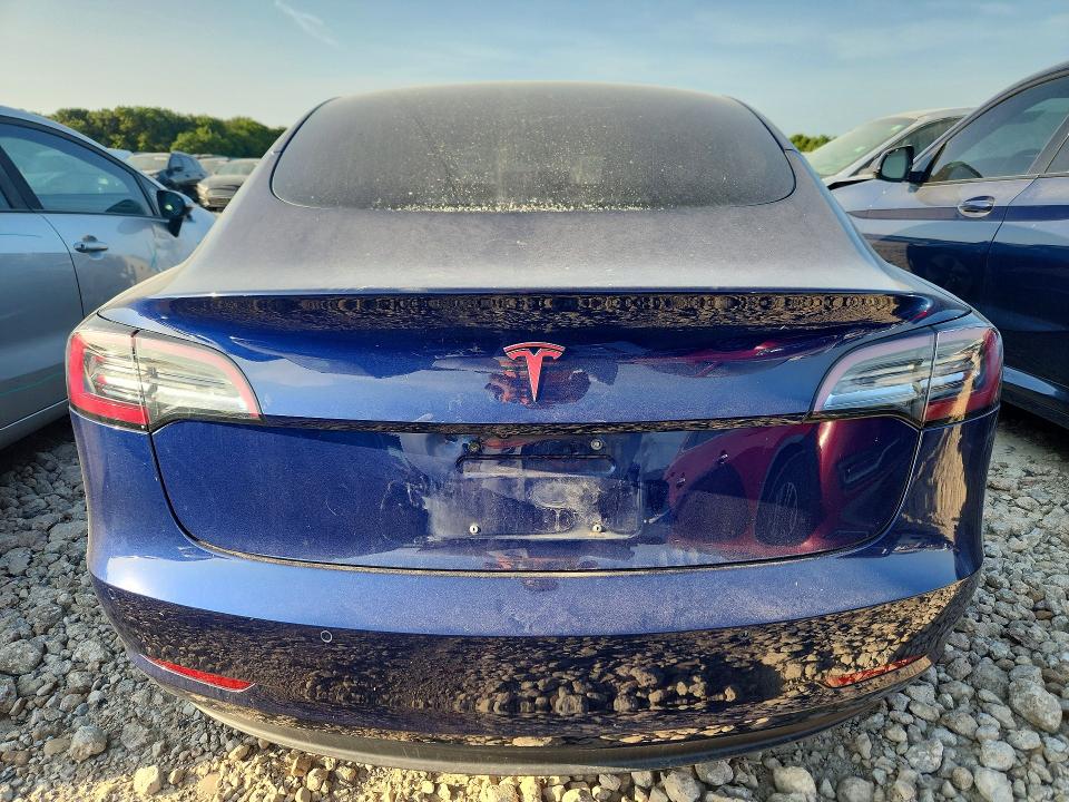Снимка 6 от търг – 2018 TESLA MODEL 3 с VIN 5YJ3E1EA9JF102597