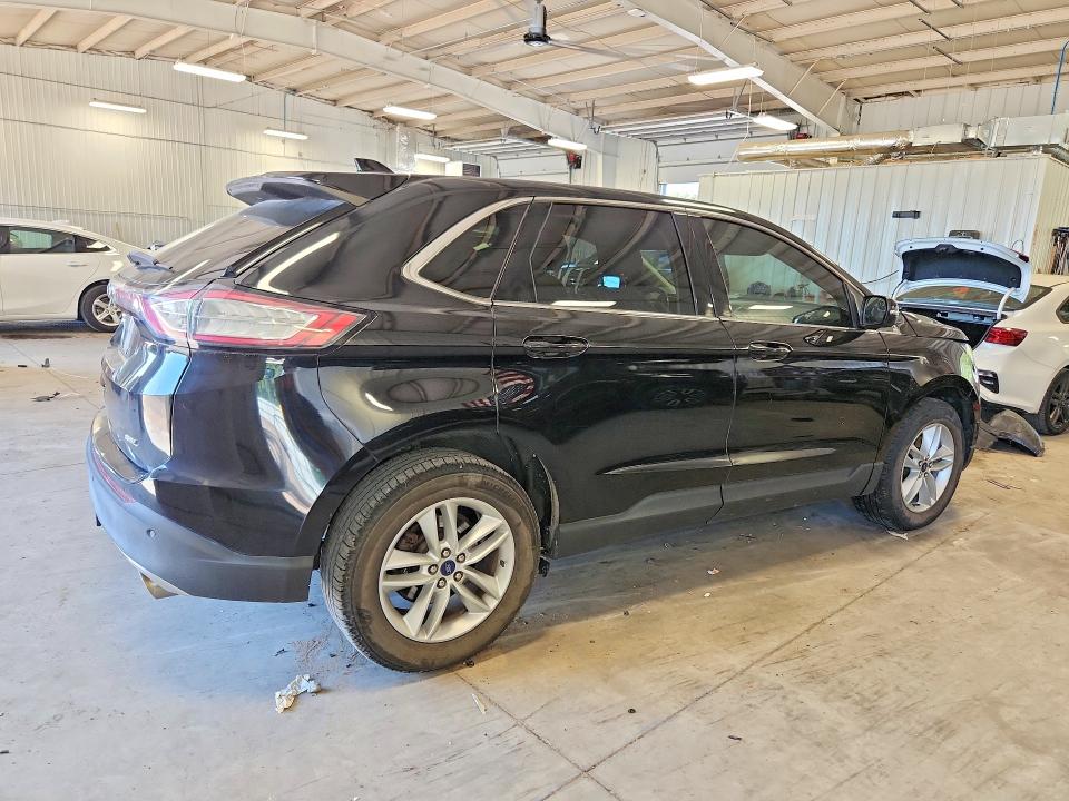 Photo 3 from auction – 2016 FORD EDGE with VIN 2FMPK3J83GBC36354