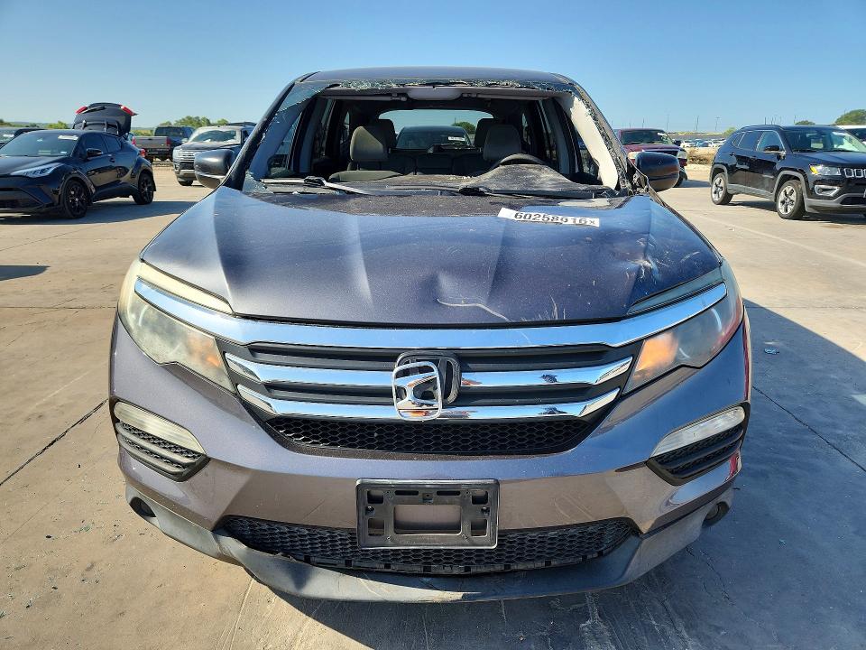 Photo 5 from auction – 2016 HONDA PILOT with VIN 5FNYF5H15GB025094