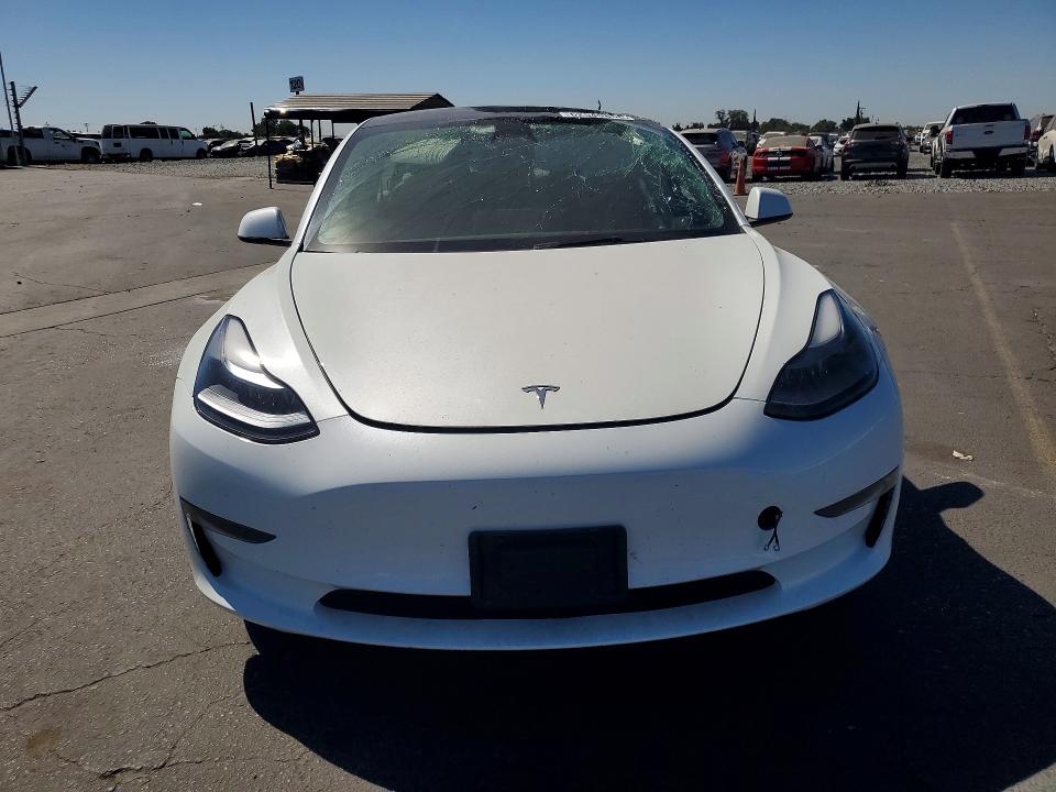 Photo 5 from auction – 2023 TESLA MODEL 3 with VIN 5YJ3E1EA1PF572194