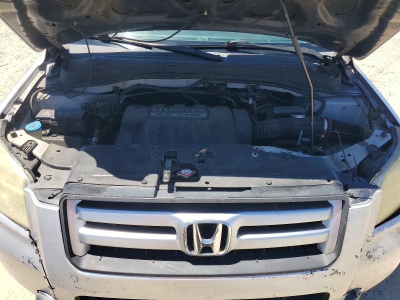 Photo 12 from auction – 2006 HONDA PILOT with VIN 2HKYF18586H532650