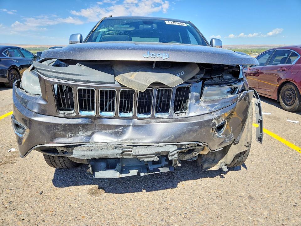 Photo 5 from auction – 2014 JEEP GRAND CHEROKEE with VIN 1C4RJFBGXEC411574