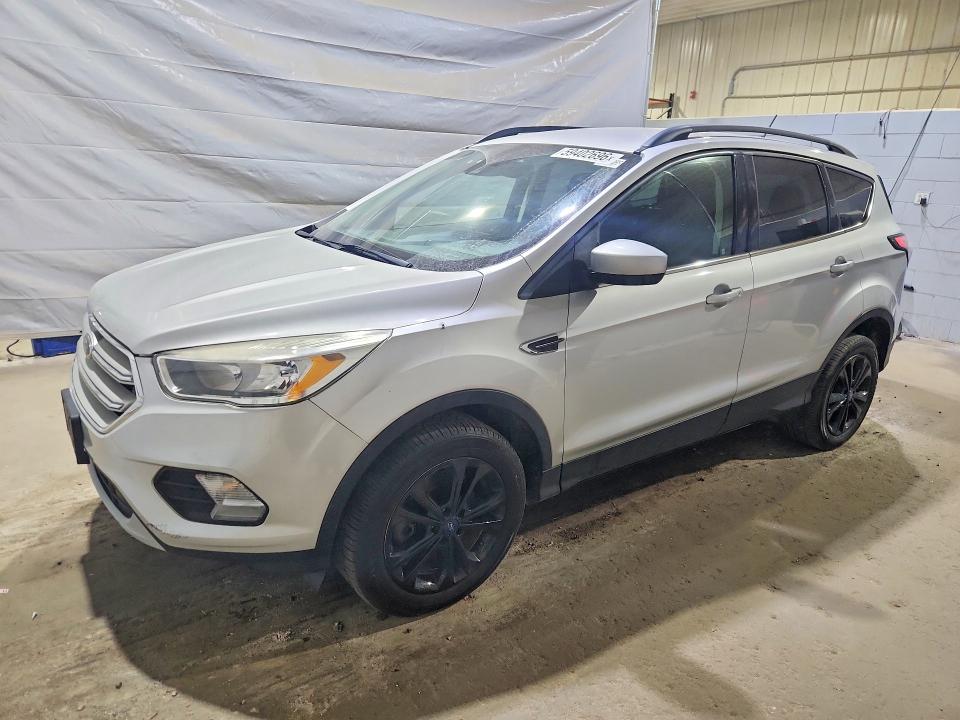FORD ESCAPE 2018 with VIN 1FMCU9GD8JUB06135 - Photo from auction